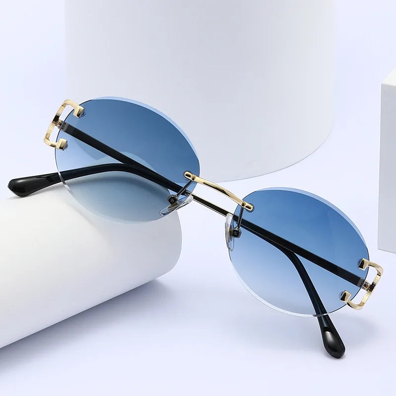Gafas de sol redondas sin montura para mujer, anteojos de sol de Metal recortados, de moda Retro, con ojos redondos pequeños, de lujo, de aleación para fiesta de compras, 2023
