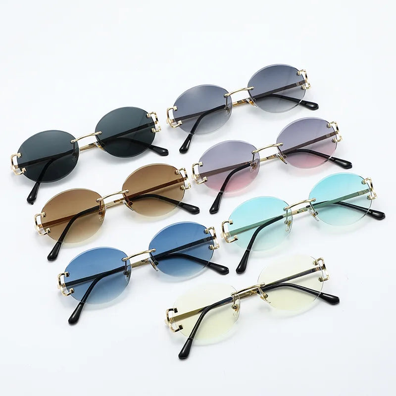 Gafas de sol redondas sin montura para mujer, anteojos de sol de Metal recortados, de moda Retro, con ojos redondos pequeños, de lujo, de aleación para fiesta de compras, 2023